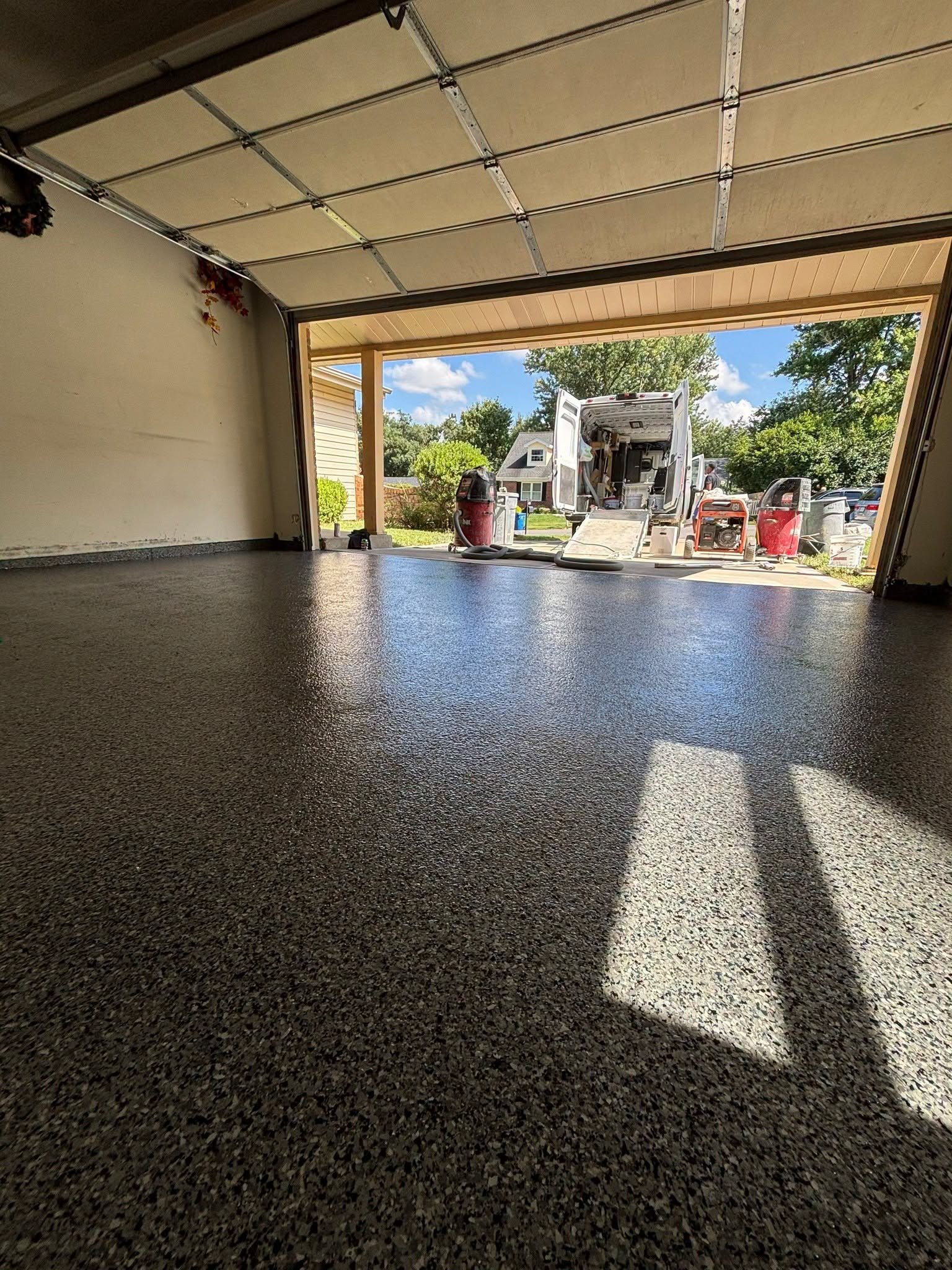 How Garage Floor Coatings Handle Summer Heat and Humidity