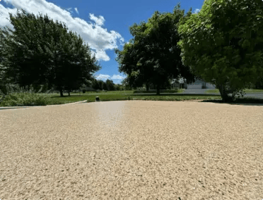 Residential driveway after concrete coating installation