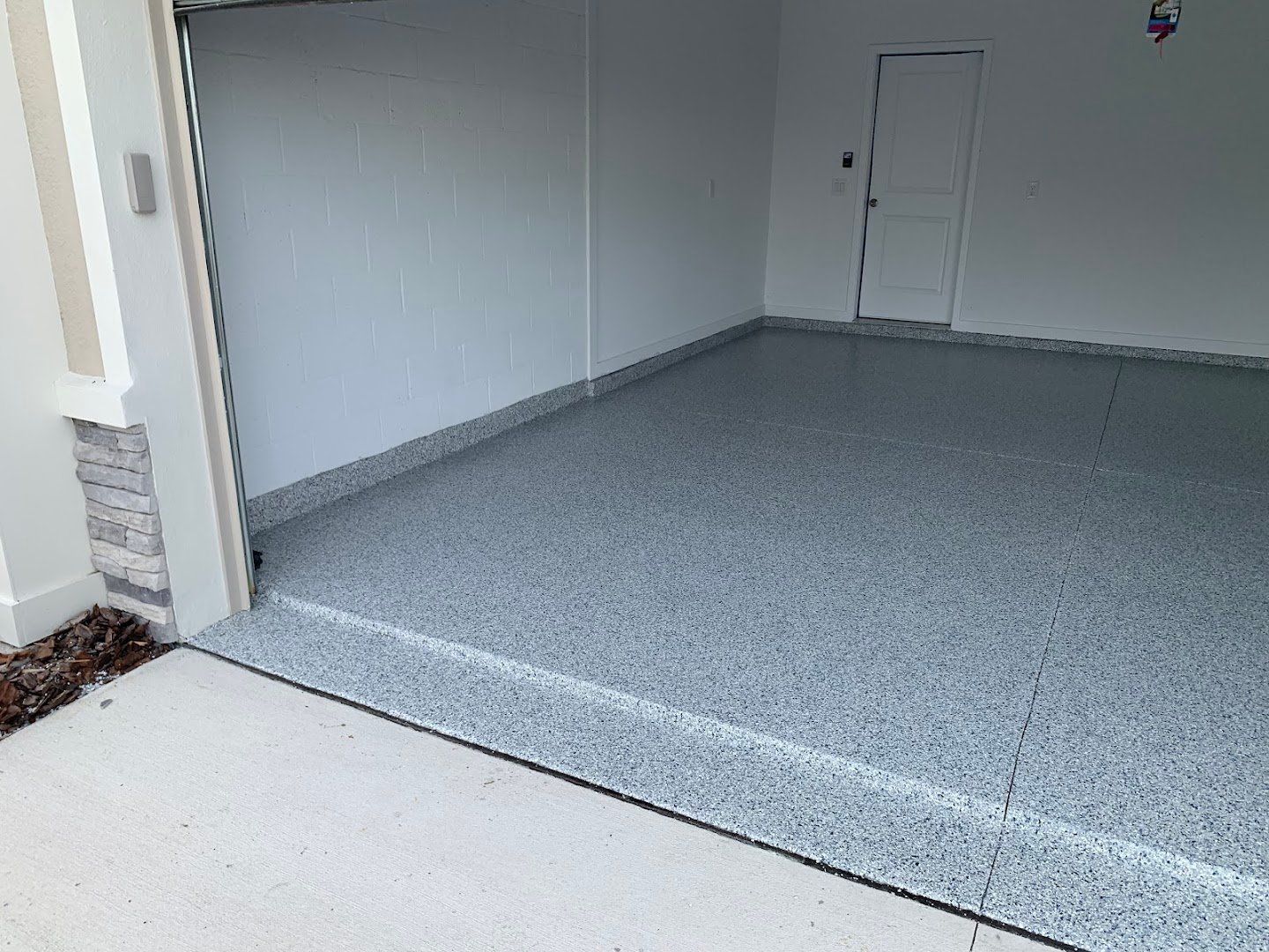 Floor coating installation by Trademark Garage Floors in New Port Richey, FL